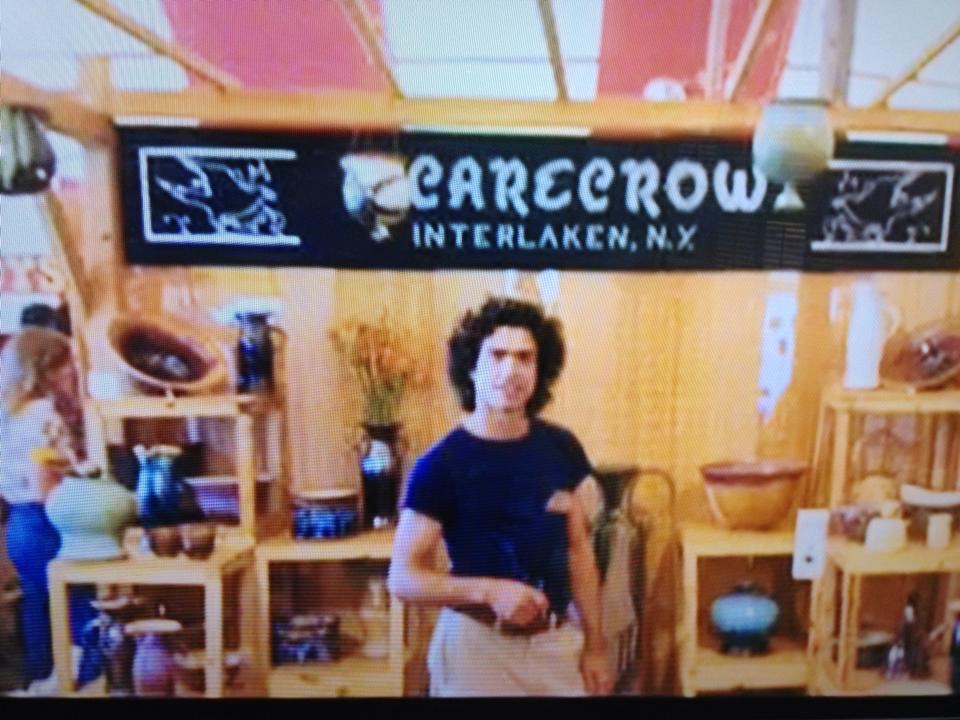 Young Buddy at the Scarecrow Pottery booth, Interlaken, NY