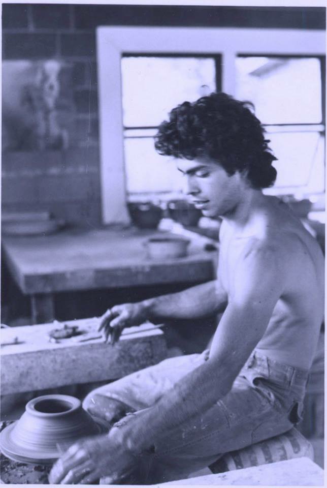 Young Buddy throwing on the pottery wheel at Alfred University