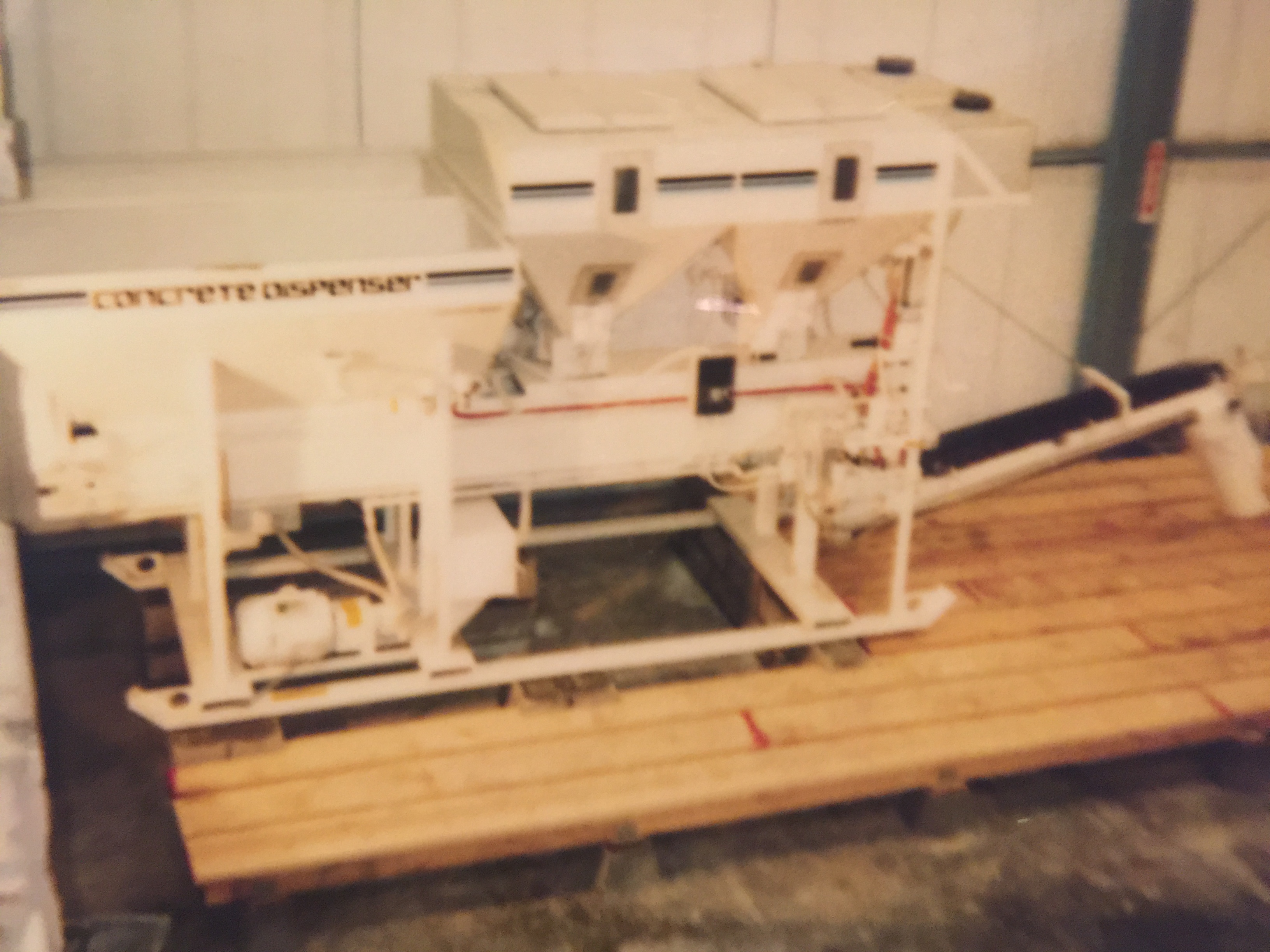 Concrete countertop with green tile backsplash