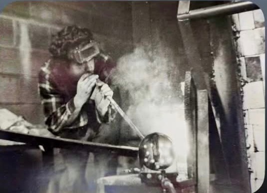 Buddy glassblowing at art school