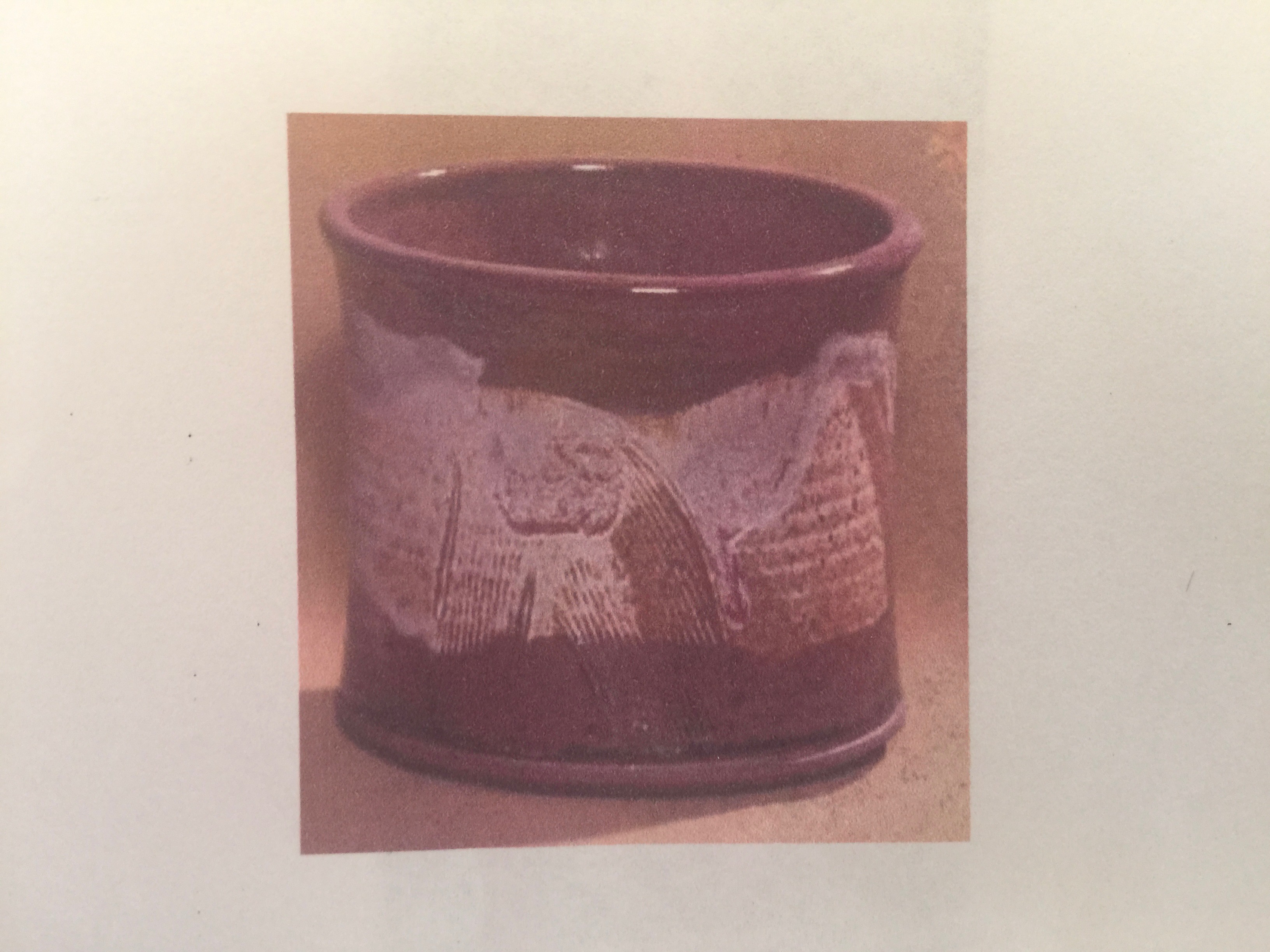 Decorated ceramic cup