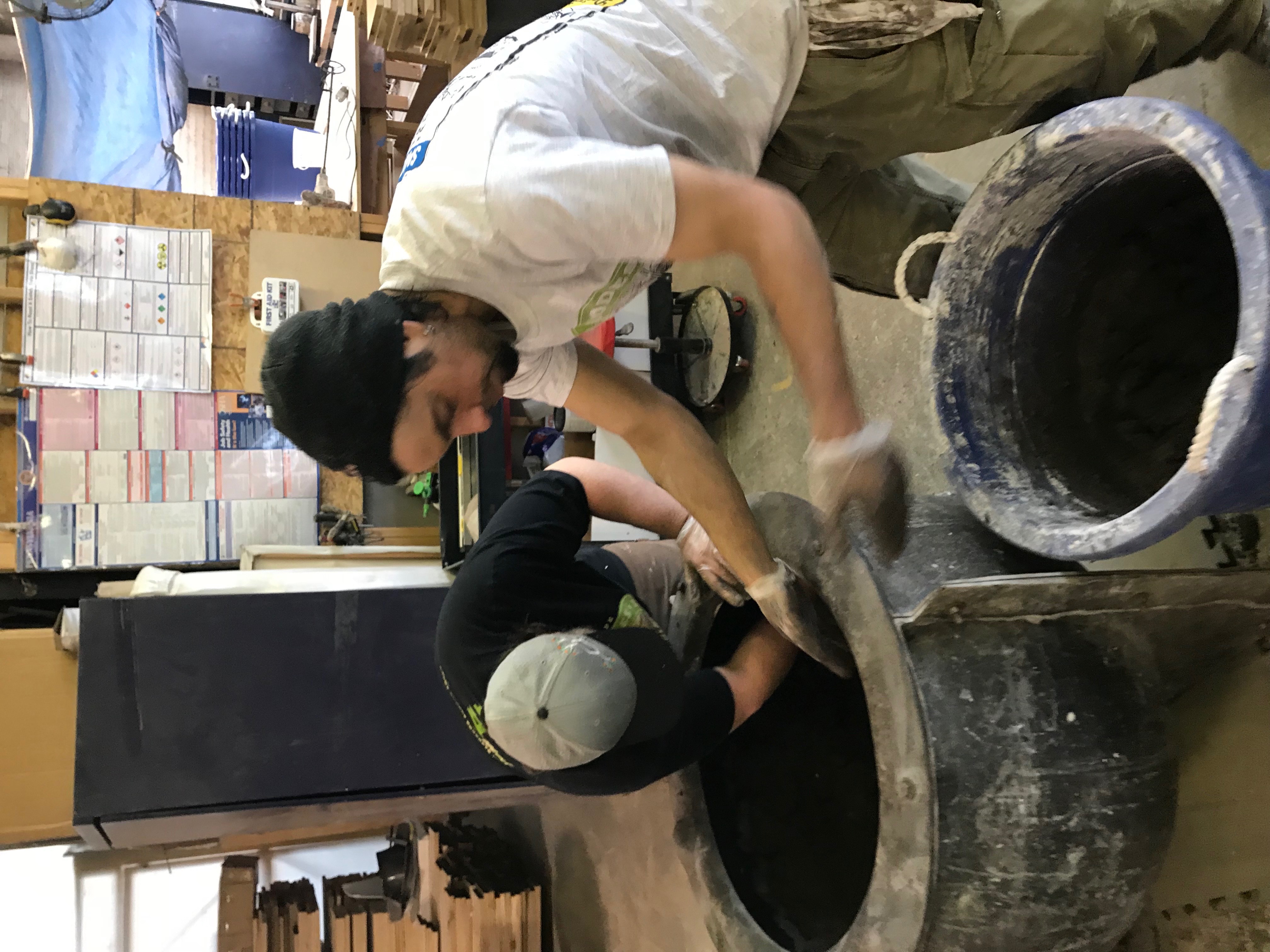 Concrete kitchen island with integrated sink
