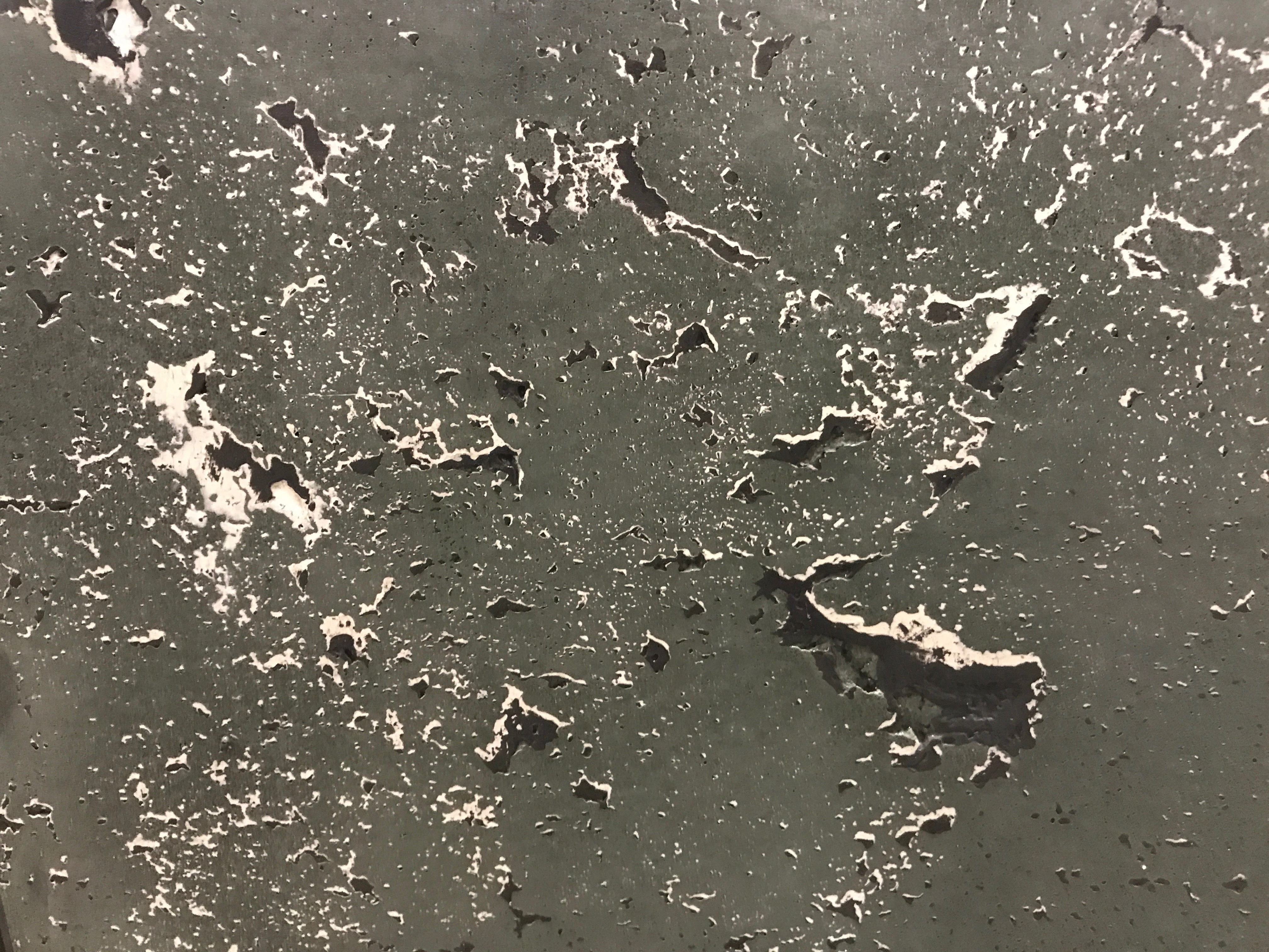 Dark charcoal decorative concrete surface
