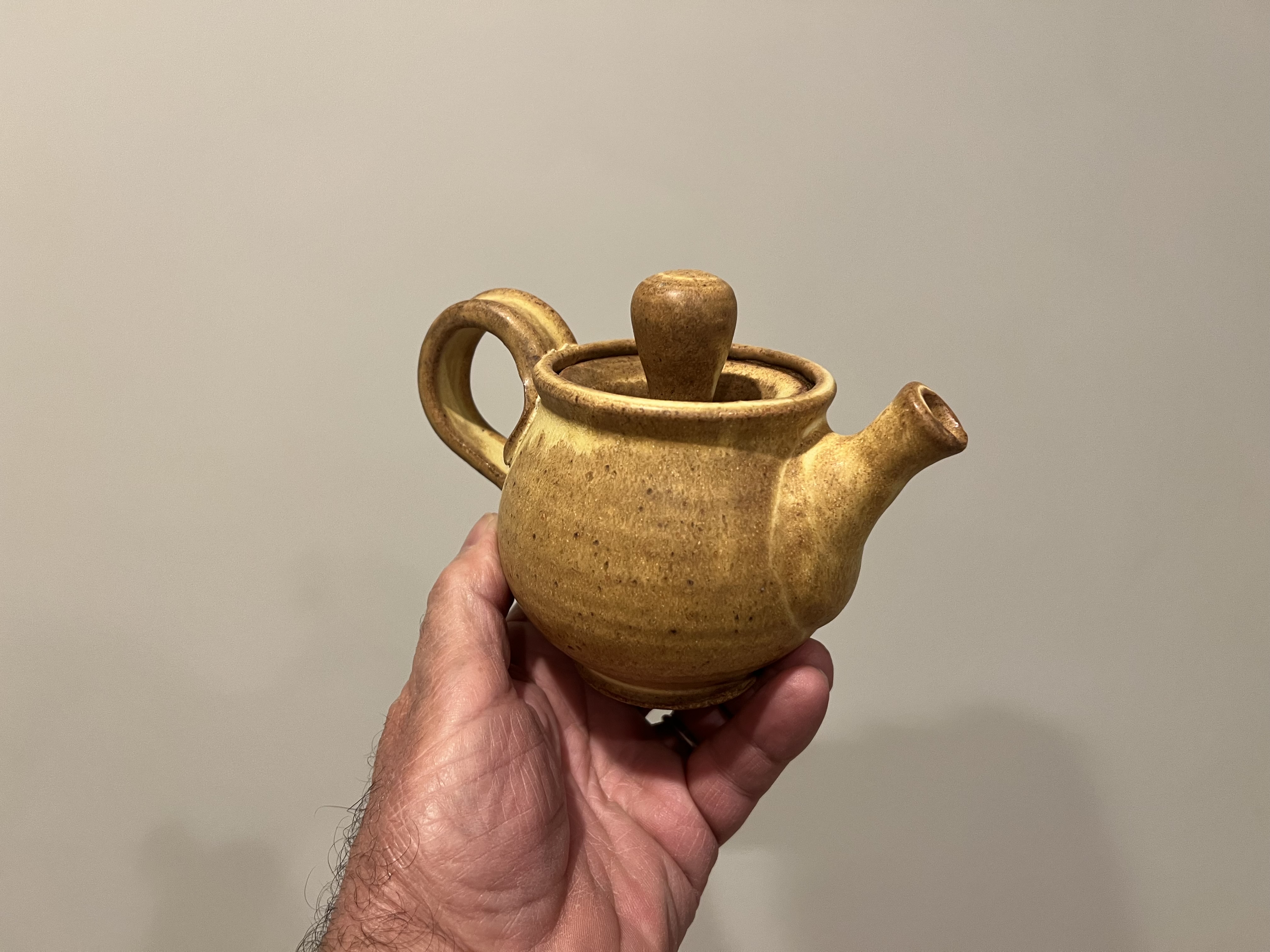 Golden amber teapot