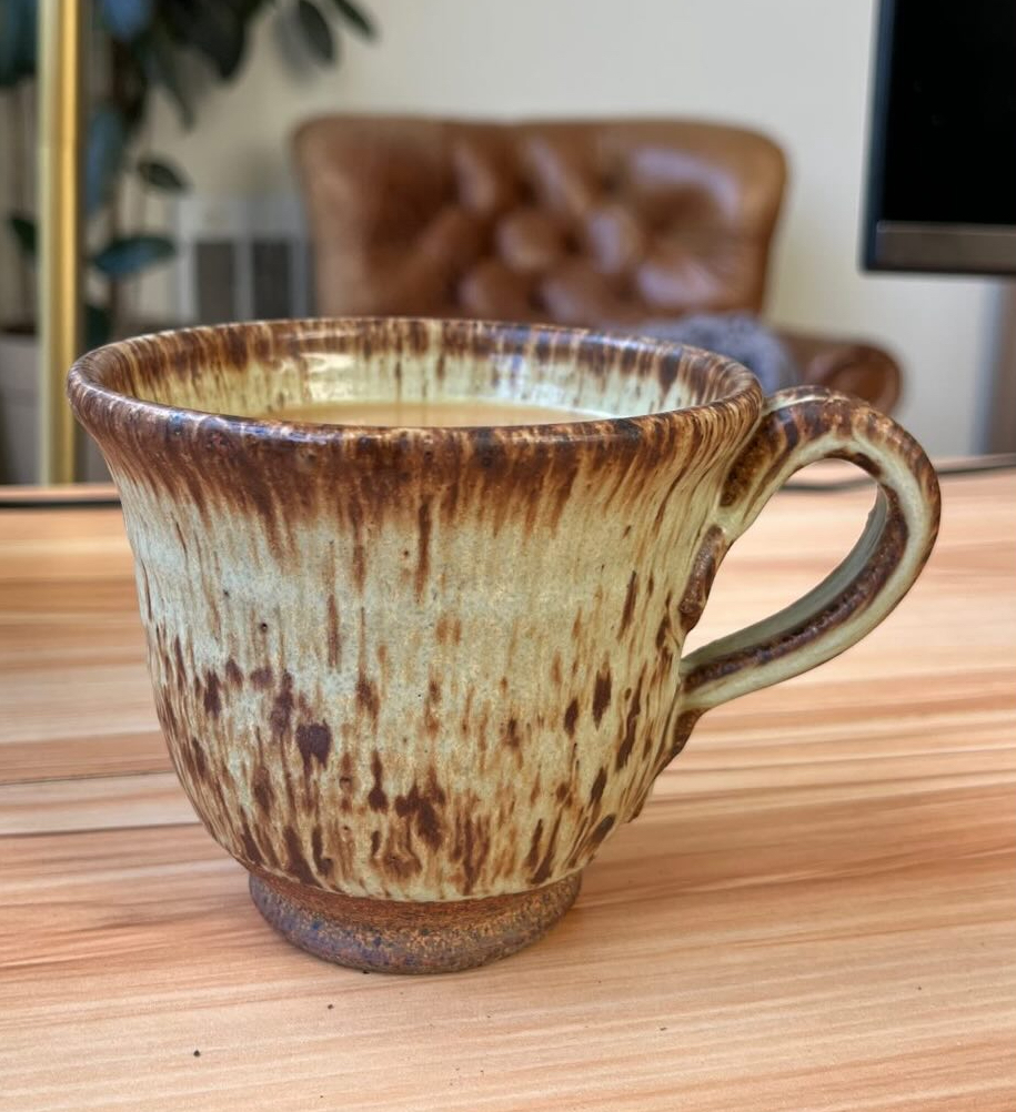 Brown and amber mug with drip glaze