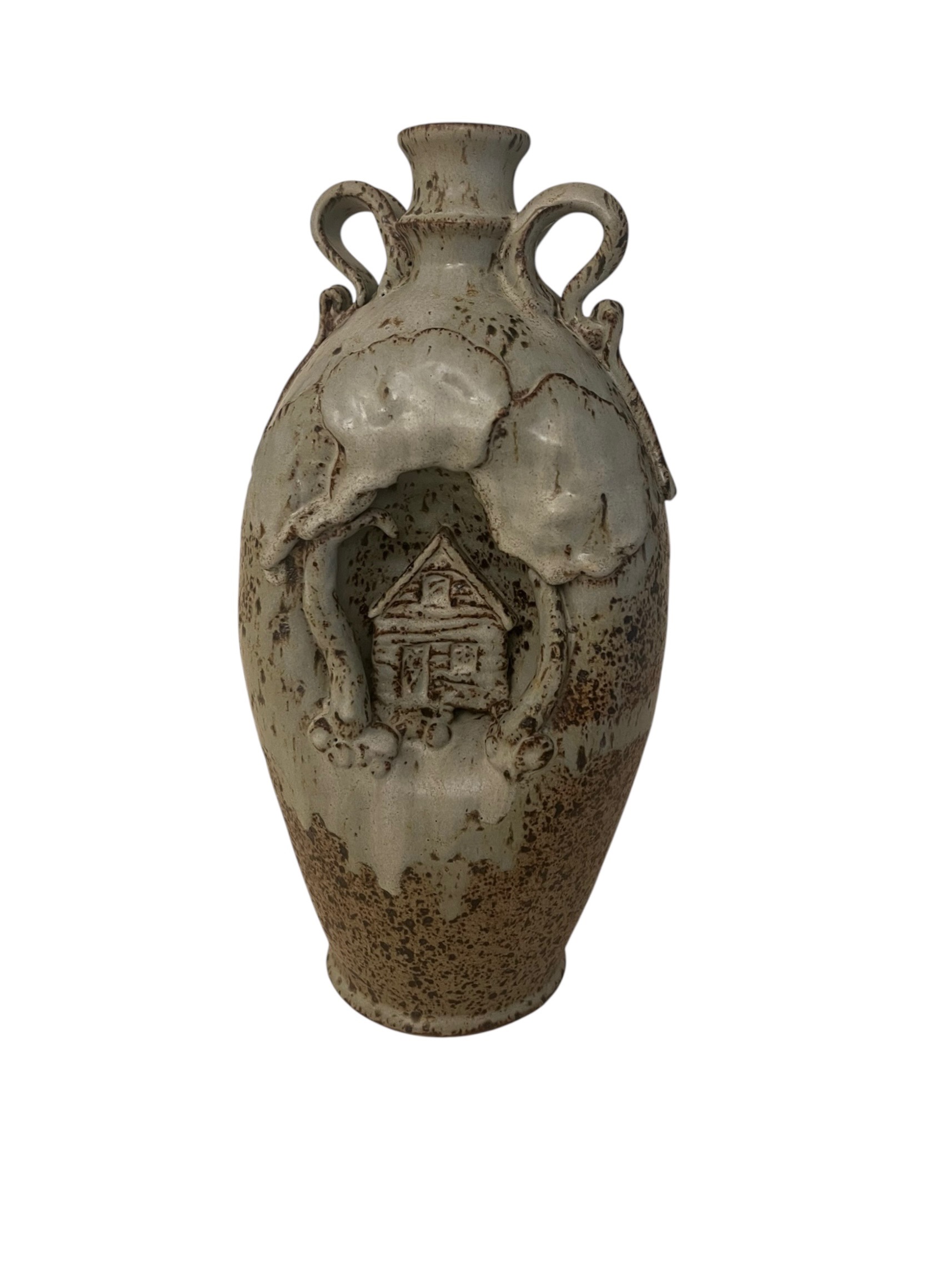 Large decorative vessel with sculpted house and tree motif